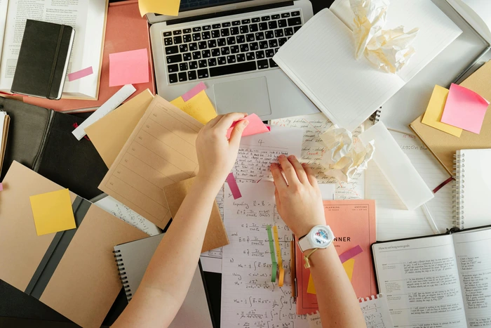 lots of paperworks on the desk