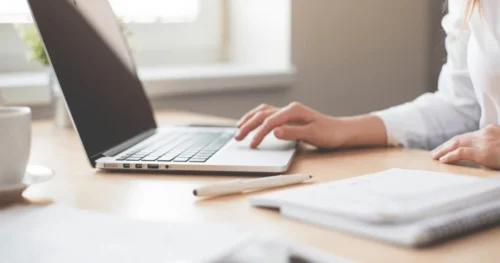 an employee working on a laptop
