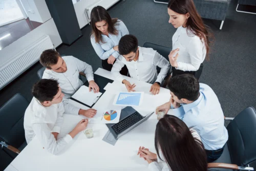 employees collaborating on a meeting