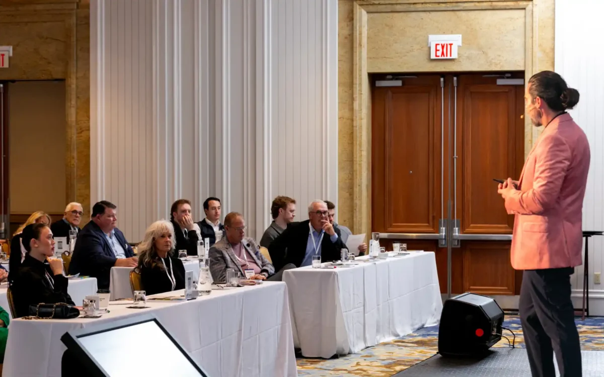 Anthony Rice of PeoplePartners presenting to attendees during corporate conference session