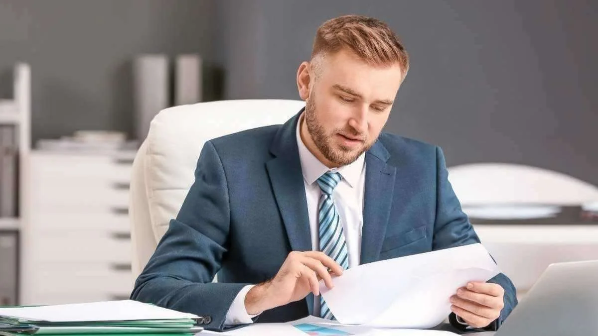 busy young manager in a formal suit
