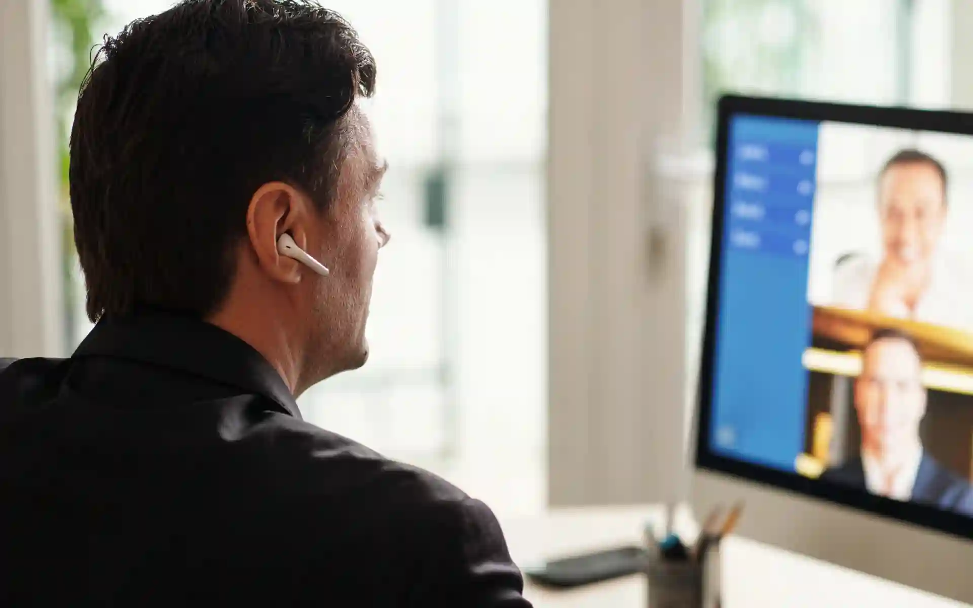 Founder speaking with offshore staffing consultant about role design before hiring